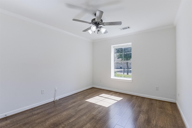 819 Earhart Ave, Grand Prairie, TX 75051 - spare room featuring dark wood finished floors, ornamental molding, baseboards, and a ceiling fan