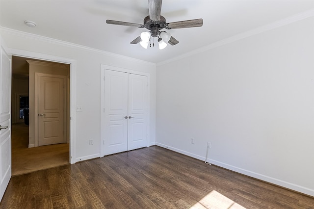 819 Earhart Ave, Grand Prairie, TX 75051 - unfurnished bedroom featuring dark wood-style flooring, baseboards, a closet, and crown molding