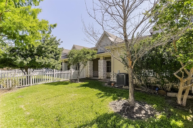 819 Earhart Ave, Grand Prairie, TX 75051 - view of yard featuring central air condition unit