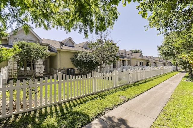 819 Earhart Ave, Grand Prairie, TX 75051 - view of front facade featuring stucco siding and stone siding