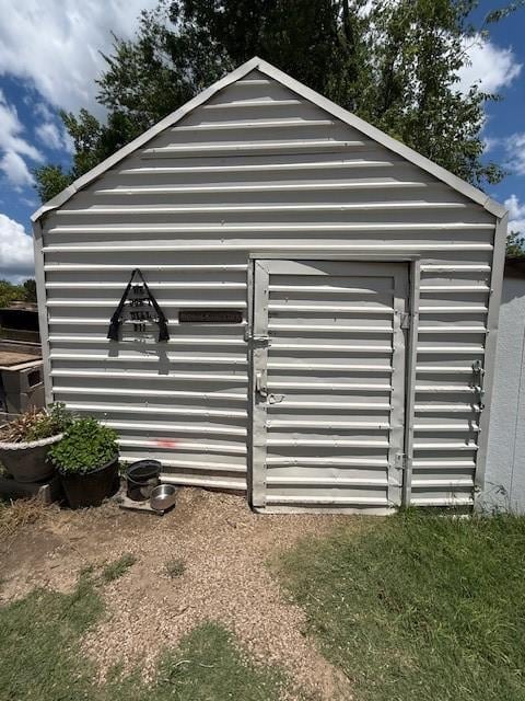 7700 County Road 144, Stephenville, TX 76401 - gate with an outbuilding and a shed