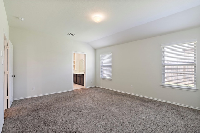 2302 Torch Lake Dr, Forney, TX 75126 - unfurnished room with light colored carpet, baseboards, and lofted ceiling