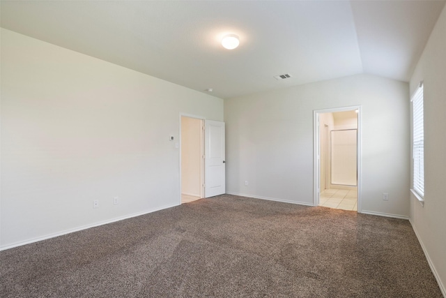 2302 Torch Lake Dr, Forney, TX 75126 - unfurnished room featuring light carpet, vaulted ceiling, and baseboards