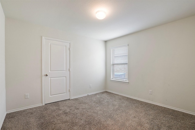 2302 Torch Lake Dr, Forney, TX 75126 - carpeted empty room featuring baseboards