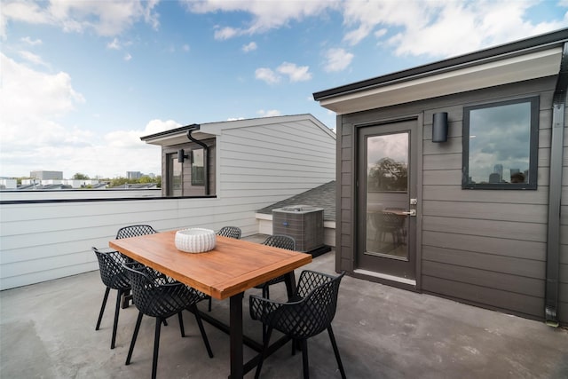 view of patio / terrace featuring central AC unit and outdoor dining space