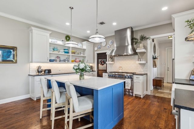 613 Park Place Blvd, Rockwall, TX 75087 - kitchen featuring open shelves, high end stainless steel range oven, wall chimney exhaust hood, backsplash, and ornamental molding