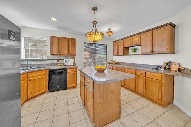 2802 Glen Ridge Dr, Arlington, TX 76016 - kitchen with dishwasher, a sink, stainless steel refrigerator, a kitchen island, and decorative light fixtures