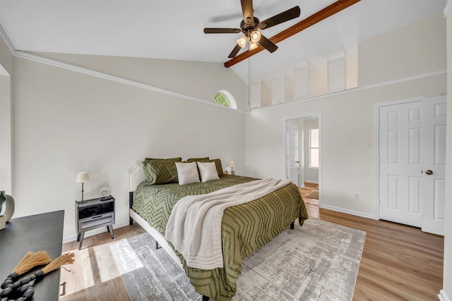 2802 Glen Ridge Dr, Arlington, TX 76016 - bedroom featuring wood finished floors, high vaulted ceiling, baseboards, a ceiling fan, and beam ceiling