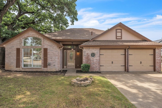 2802 Glen Ridge Dr, Arlington, TX 76016 - view of front of home with a garage, driveway, and brick siding