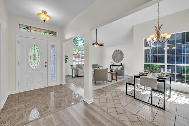 2802 Glen Ridge Dr, Arlington, TX 76016 - entrance foyer featuring a chandelier, baseboards, and a high ceiling
