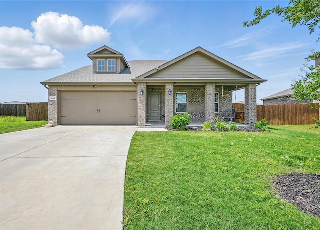 305 Sage St, Anna, TX 75409 - view of front of home with concrete driveway, an attached garage, a porch, brick siding, and roof with shingles