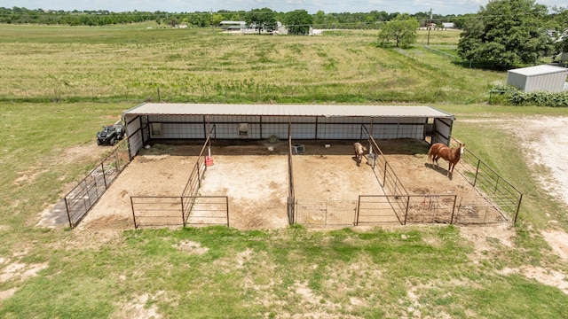 1545 County Road 130, Stephenville, TX 76401 - surrounding community with a rural view, an outdoor structure, and an outbuilding