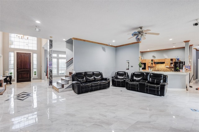 living room featuring light marble finish floors, ceiling fan, stairway, recessed lighting, and crown molding