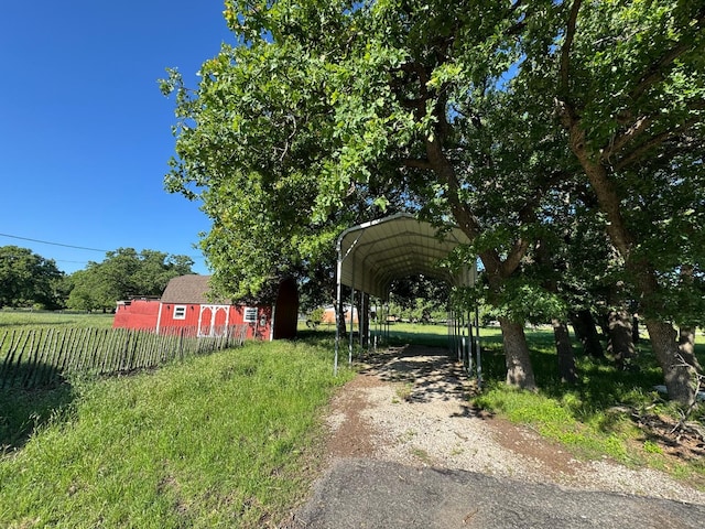 1946 US Highway 380 E, Graham, TX 76450 - view of yard featuring a carport and driveway