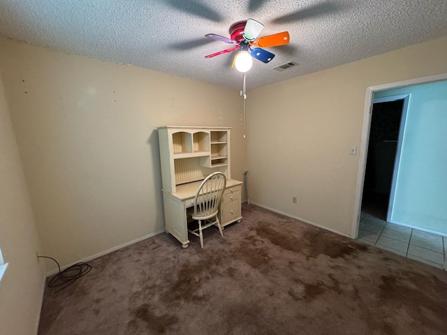 1946 US Highway 380 E, Graham, TX 76450 - office space featuring a ceiling fan, carpet flooring, a textured ceiling, and baseboards