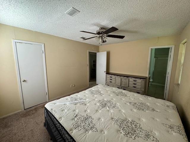 1946 US Highway 380 E, Graham, TX 76450 - carpeted bedroom featuring a ceiling fan and a textured ceiling