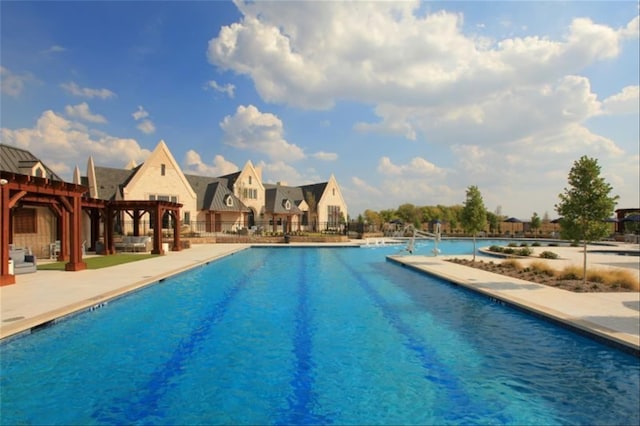 2809 Somerset Ln, Celina, TX 75009 - community pool featuring a pergola, a patio, and fence