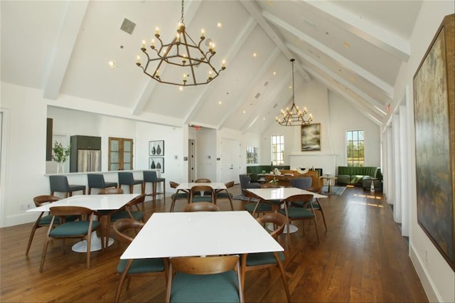 2809 Somerset Ln, Celina, TX 75009 - dining area featuring high vaulted ceiling, a chandelier, beamed ceiling, and wood finished floors