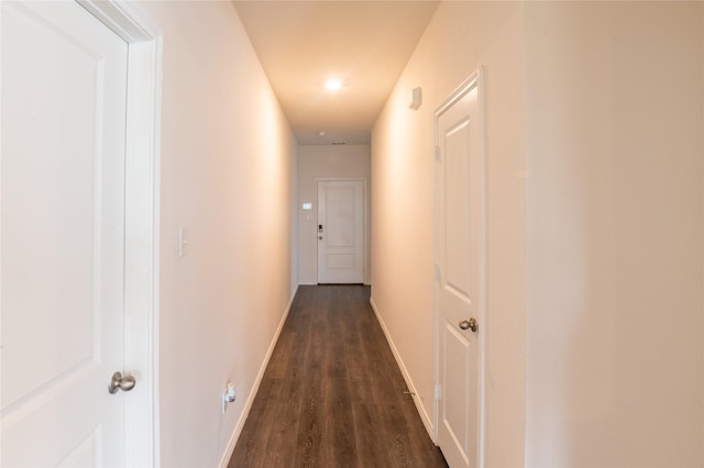 3929 Dickinson Ave, Aubrey, TX 76227 - hallway with dark wood-style flooring and baseboards