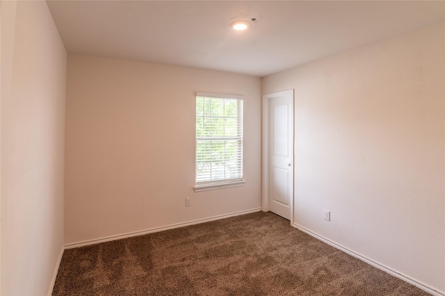 3929 Dickinson Ave, Aubrey, TX 76227 - carpeted empty room with baseboards