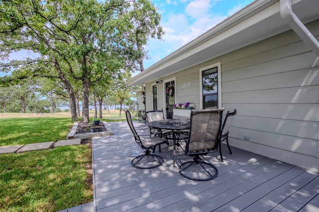 8 Tula Ct, Nocona, TX 76255 - deck with a yard and outdoor dining area