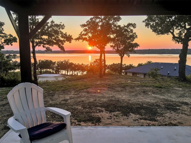 8 Tula Ct, Nocona, TX 76255 - view of yard with a water view