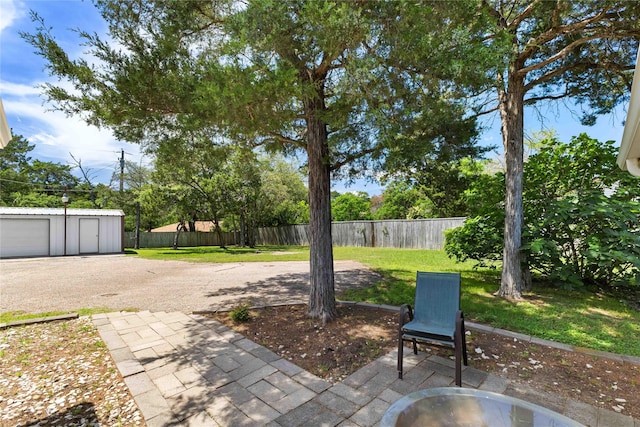218 Rainbow Dr, Woodway, TX 76712 - view of patio with an outdoor structure