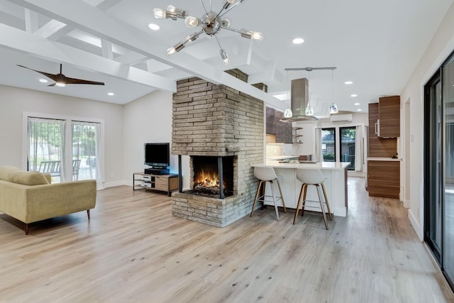 405 Martin Ln, Euless, TX 76040 - living area with plenty of natural light, a chandelier, light wood finished floors, and recessed lighting