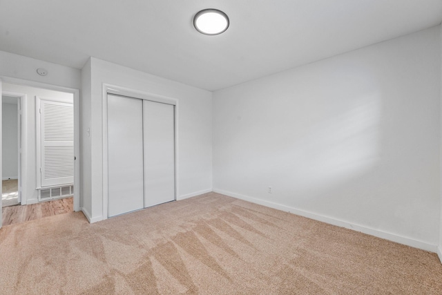 600 Circleview Dr N, Hurst, TX 76054 - unfurnished bedroom with carpet flooring, baseboards, and a closet