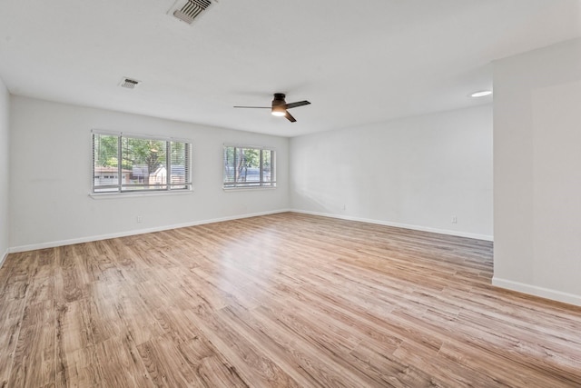 600 Circleview Dr N, Hurst, TX 76054 - unfurnished room with light wood-style flooring, ceiling fan, and baseboards
