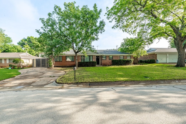 600 Circleview Dr N, Hurst, TX 76054 - ranch-style home featuring driveway, brick siding, and a front lawn