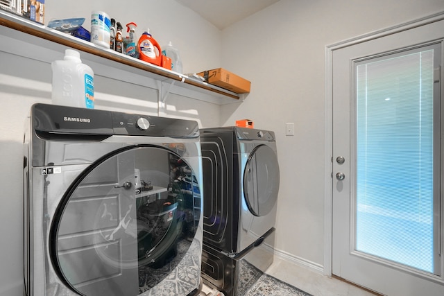 2825 Hale Rd, Celina, TX 75009 - laundry area featuring baseboards, washer and clothes dryer, and tile patterned flooring