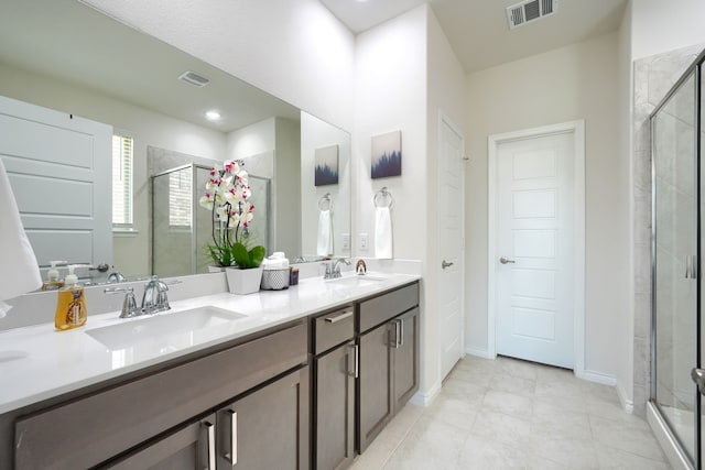 2825 Hale Rd, Celina, TX 75009 - bathroom featuring double vanity, a shower stall, and tile patterned flooring