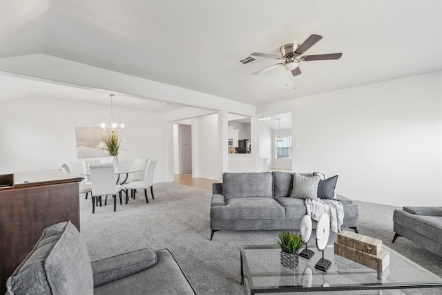 813 Canyon Pl, Desoto, TX 75115 - living room featuring light carpet, a ceiling fan, and a chandelier