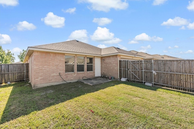 813 Canyon Pl, Desoto, TX 75115 - back of house featuring brick siding, a gate, and a shingled roof