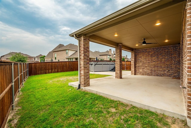 1429 Bridgewater Blvd, Celina, TX 75009 - view of yard featuring a jacuzzi, a patio, ceiling fan, and a residential view