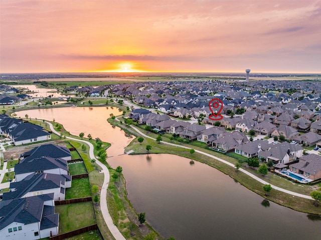 1429 Bridgewater Blvd, Celina, TX 75009 - aerial view at dusk of a residential view and a water view