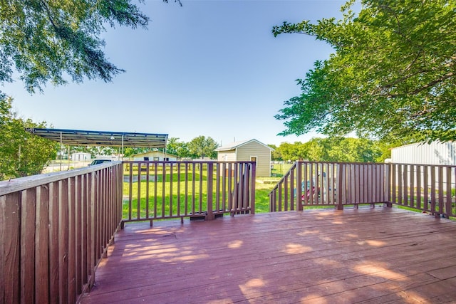 1009 W 7th St, Justin, TX 76247 - wooden terrace with a yard and an outdoor structure