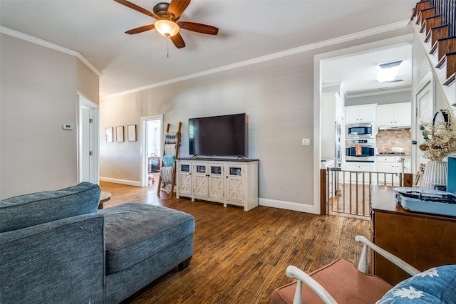 1009 W 7th St, Justin, TX 76247 - living room featuring ceiling fan, wood finished floors, ornamental molding, and baseboards