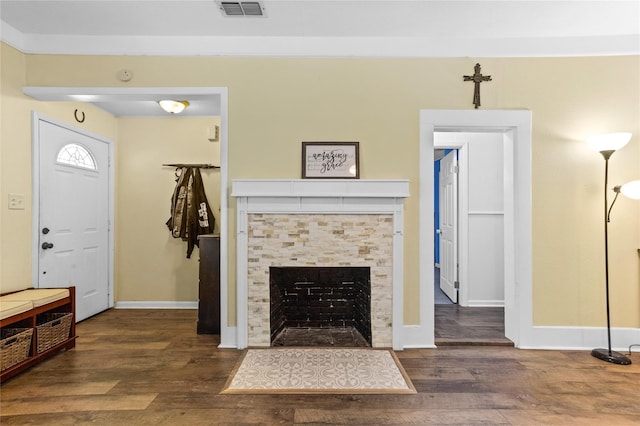 200 S Mimosa St, Paradise, TX 76073 - living room with wood finished floors, a tiled fireplace, and baseboards