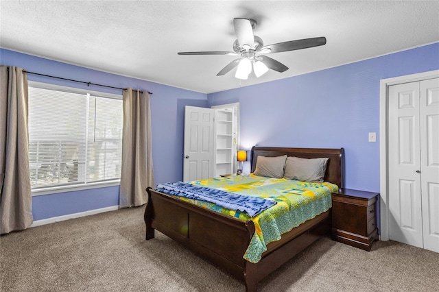 200 S Mimosa St, Paradise, TX 76073 - bedroom featuring carpet, ceiling fan, baseboards, and a textured ceiling