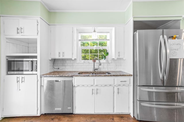 200 S Mimosa St, Paradise, TX 76073 - kitchen with appliances with stainless steel finishes, a sink, white cabinets, and stone counters