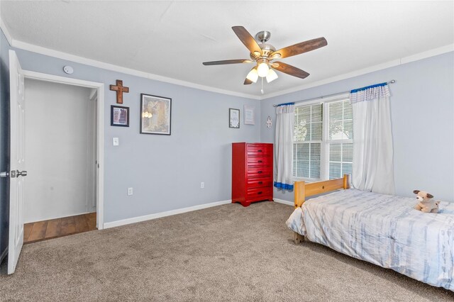 200 S Mimosa St, Paradise, TX 76073 - carpeted bedroom featuring ornamental molding, baseboards, and a ceiling fan