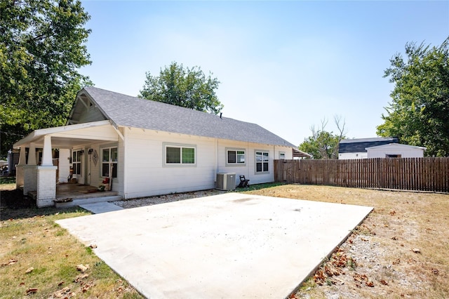 200 S Mimosa St, Paradise, TX 76073 - back of house featuring fence, cooling unit, a porch, a shingled roof, and a patio area