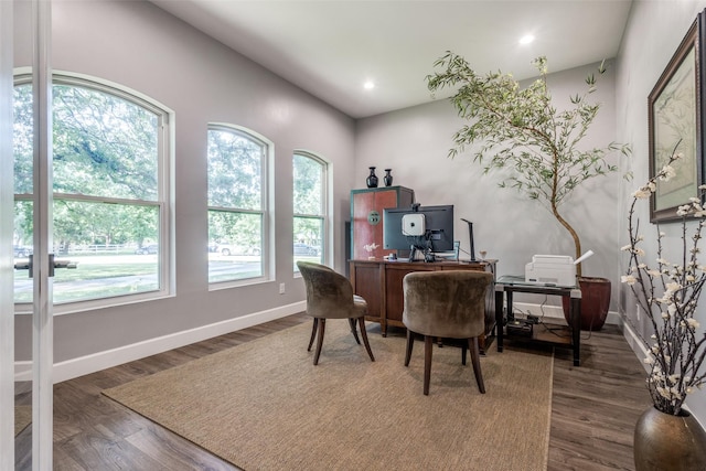 office featuring baseboards, wood finished floors, and recessed lighting