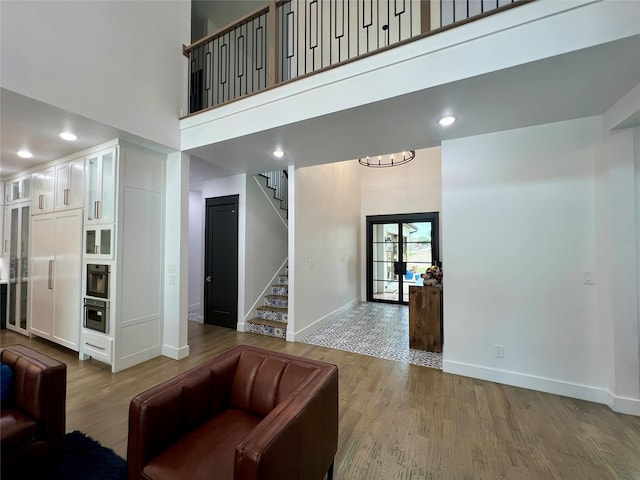 613 Wildcat Way, Kennedale, TX 76060 - common area with a towering ceiling, stairs, and recessed lighting