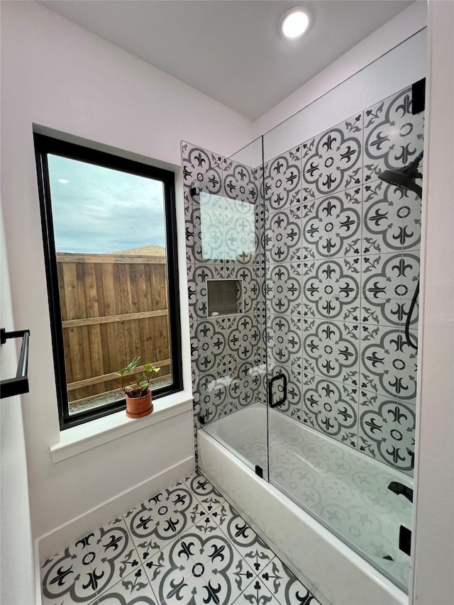 613 Wildcat Way, Kennedale, TX 76060 - full bath featuring tile patterned flooring,  shower combination, and baseboards