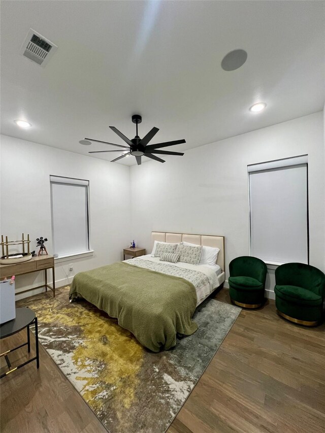 613 Wildcat Way, Kennedale, TX 76060 - bedroom with wood finished floors, a ceiling fan, and recessed lighting