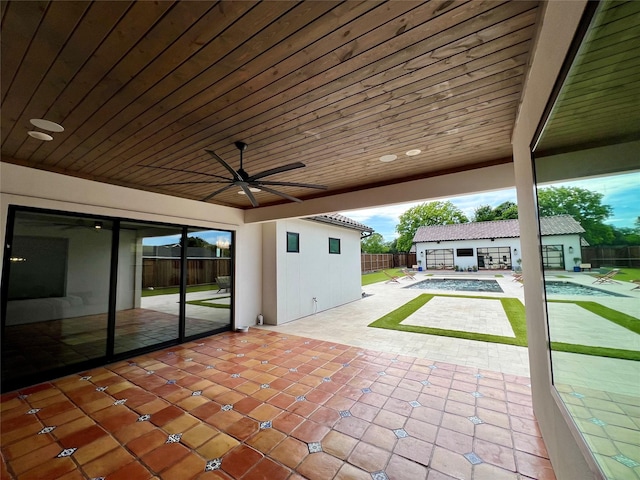 613 Wildcat Way, Kennedale, TX 76060 - view of patio featuring a fenced backyard, an outbuilding, and a ceiling fan