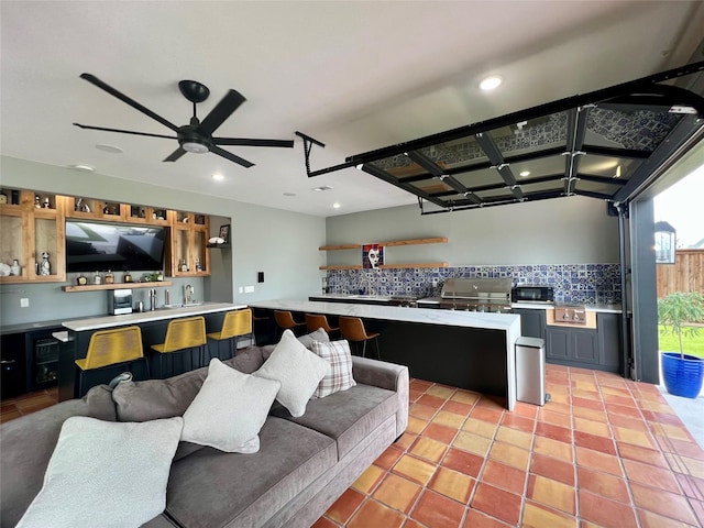 613 Wildcat Way, Kennedale, TX 76060 - living room with bar with sink, recessed lighting, light tile patterned floors, and ceiling fan